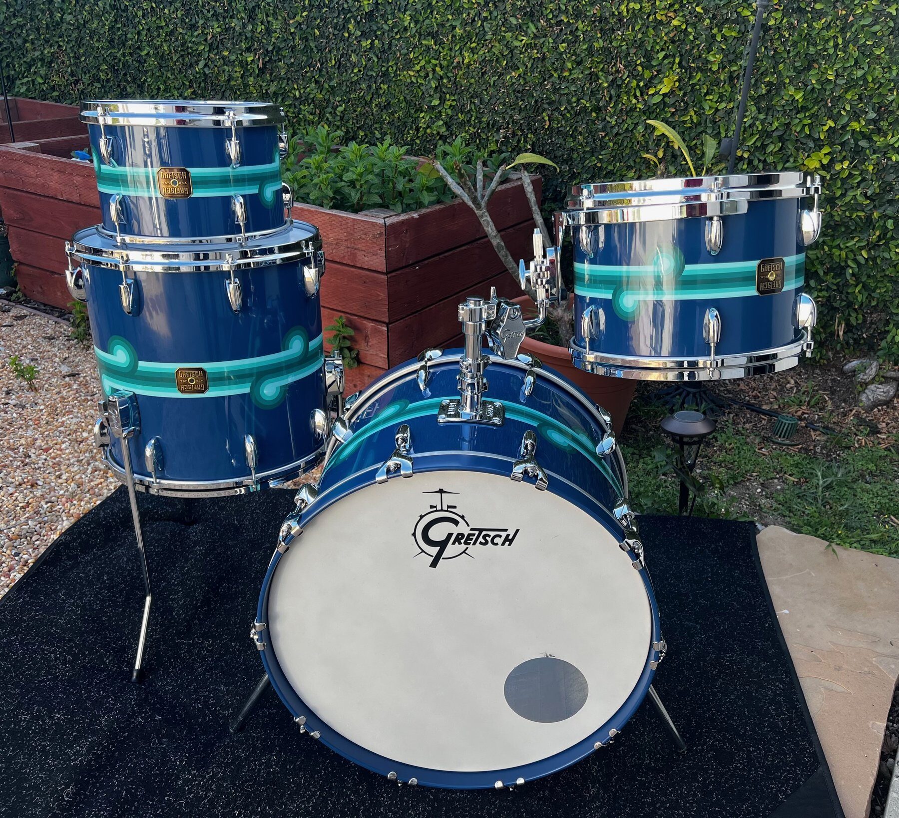 Mario Calire Gretsch kit — dark teal with custom green stripe