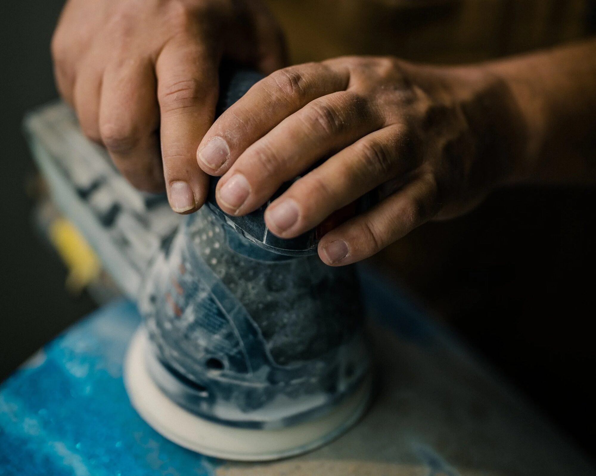 Matt Siemer sanding a drum shell by hand in the Cincinnati shop