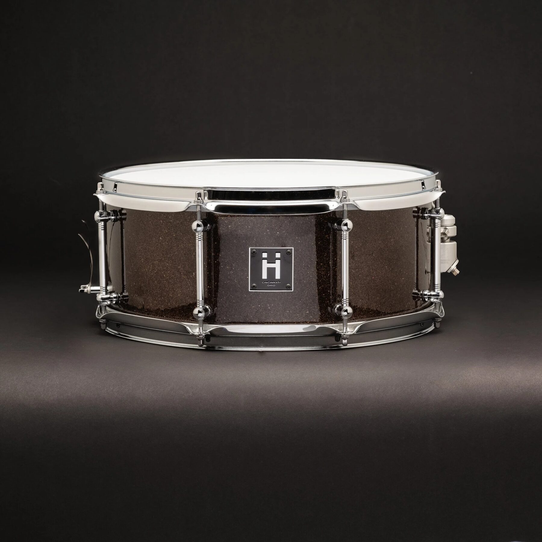 Espresso sparkle snare with the Ḧ badge