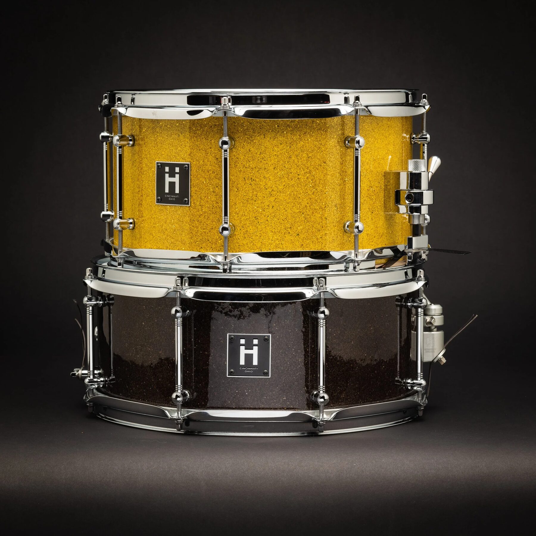 Stacked gold and orange sparkle snares